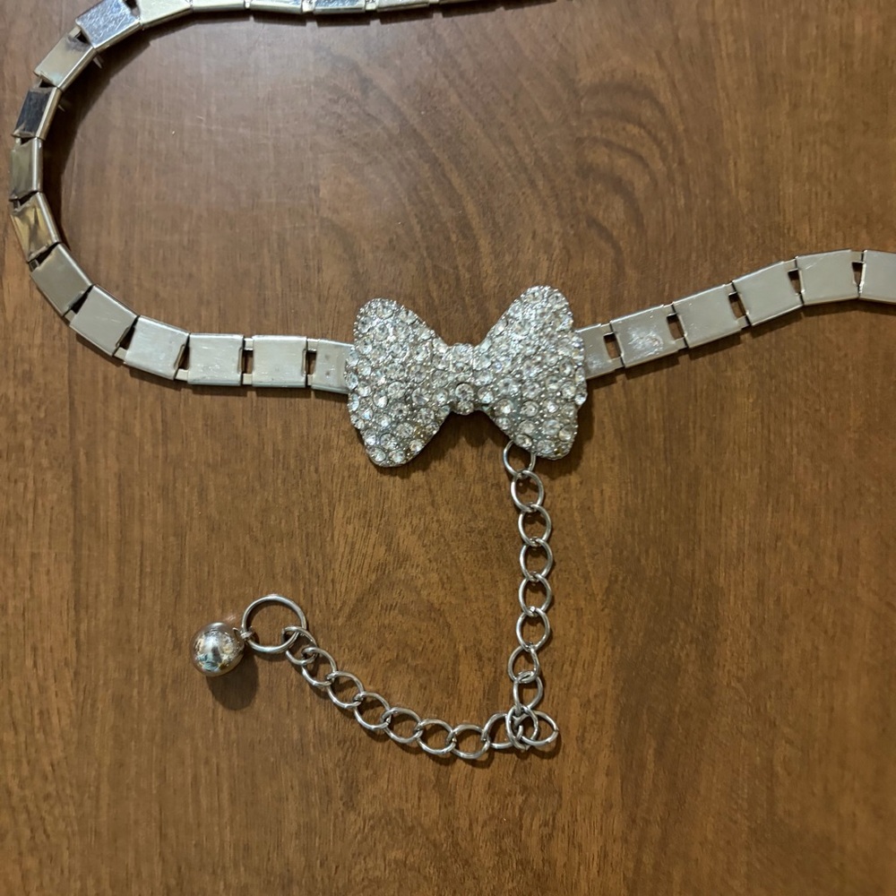 Silvertone rhinestone bow belt